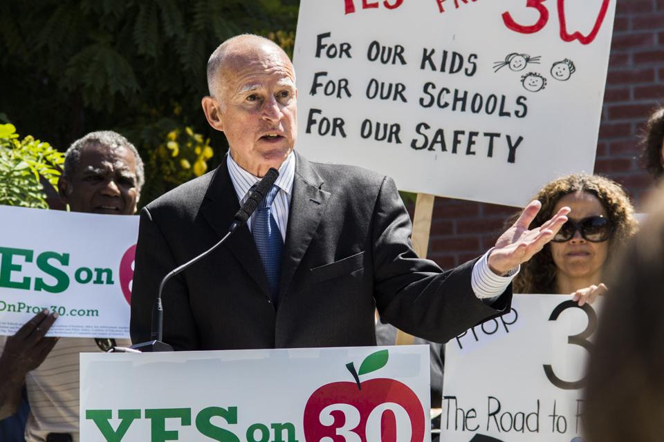 Governor Jerry Brown addresses a crowd that formed in front of the B building Aug 20. Describing the necessity of Prop 30, a proposition that, if voted through, would mean additional funding for California schools.