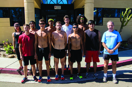 Cross country team poses before preparing for upcoming invitational .  Troy Orem, City Times