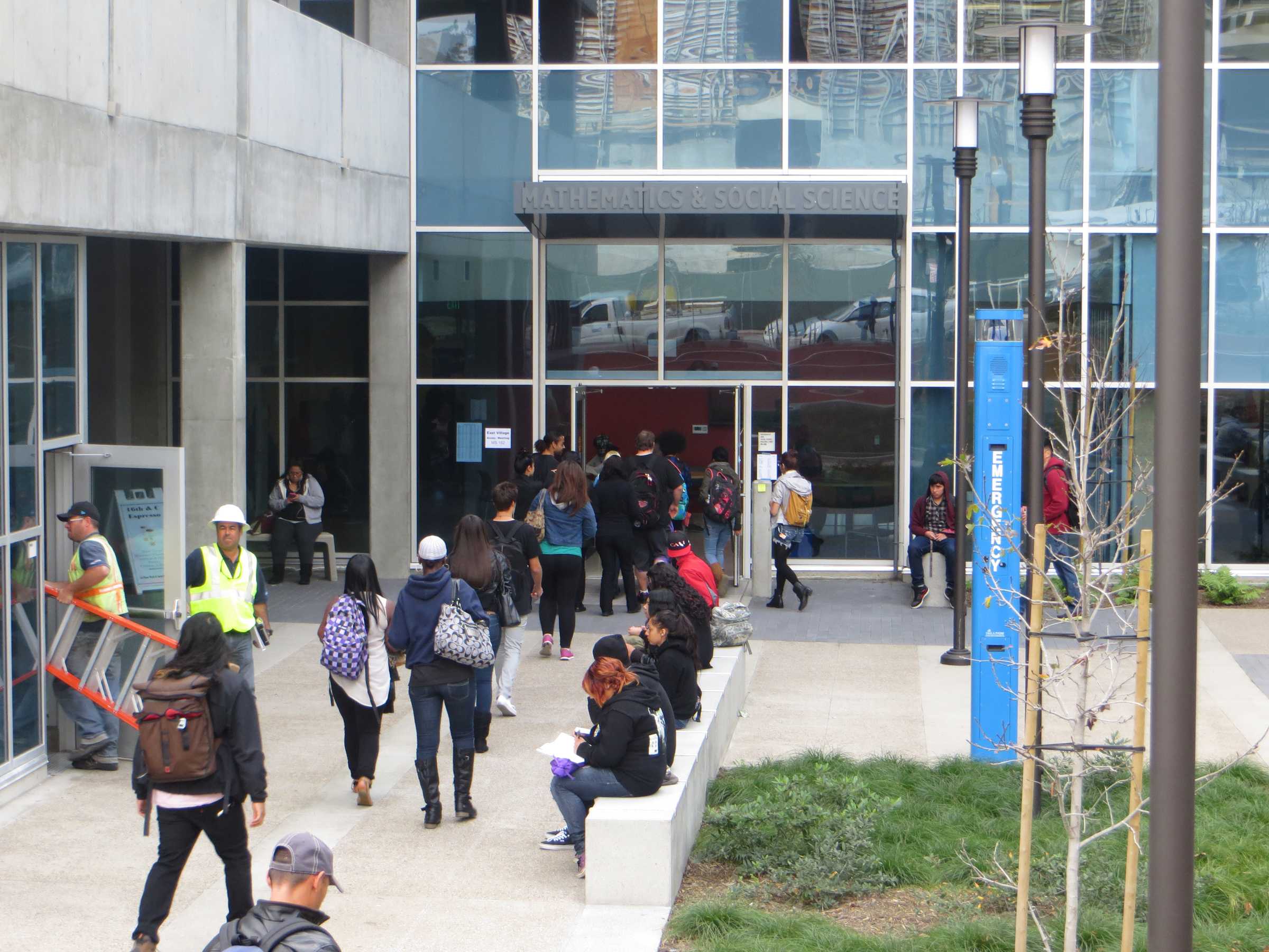 Students enter the Math and Social Sciences building for their first class, which has been open since Jan. 28. The building is located on C St and 16th St. -Ally Browne, City Times