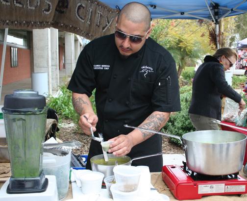 Chef Ricardo Heredia holds a cooking demonstration March 21 at Gorton Quad, hosted by Seeds@City. Michelle Moran, City Times
