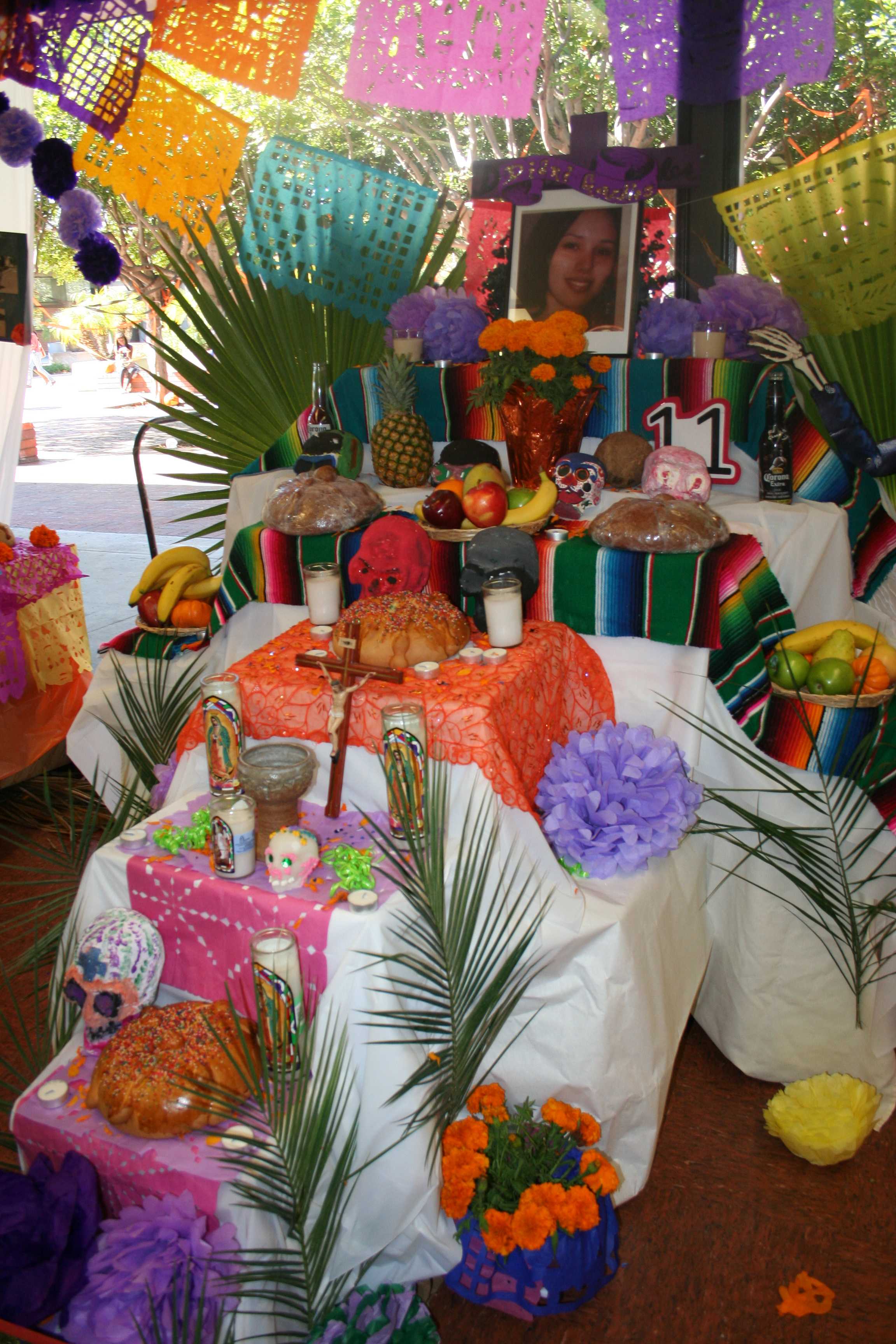 One of many different altars that were on display in the cafeteria to commemorate Dia de Los Muertos. Altars and offerings are created to honor loved ones who have perished. Michelle Moran, City Times.