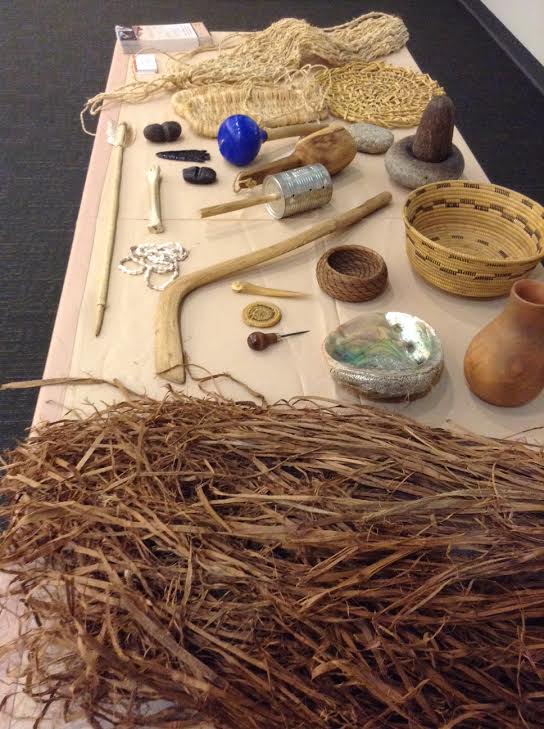 A table of several Kumeyaay Native American artifacts. Ahmad Blue, City Times.