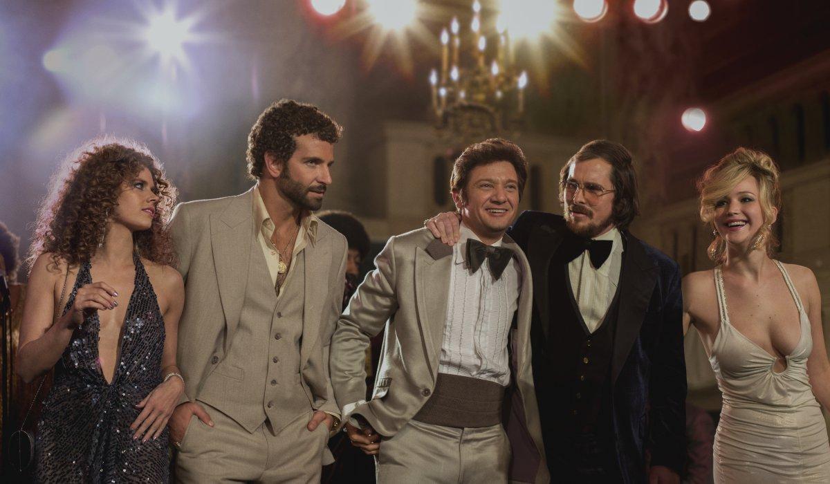 Amy Adams, Bradley Cooper, Jeremy Renner, Christian Bale and Jennifer Lawrence in American Hustle. Official image.