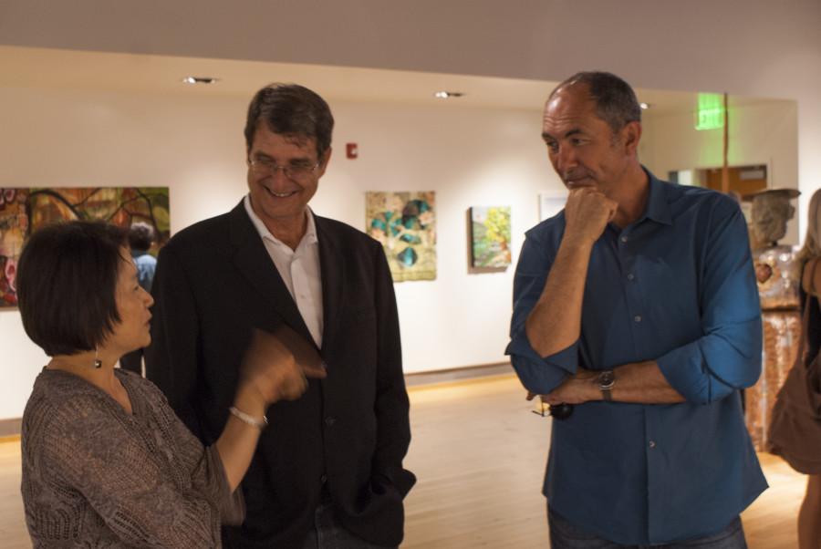 Architects Jeremey Joyce and Ryan Oesling speaking with City Gallery Art Director Y.C. Kim on Aug. 28 at a VIP opening reception. Photo credit: Torrey Spoerer