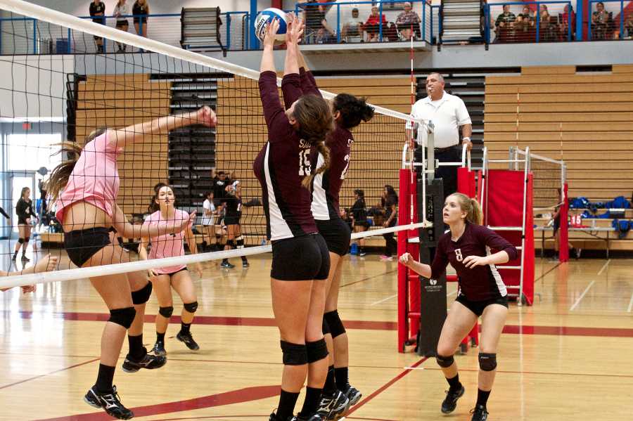 Sophomores Lisette Kelly (#15) and Mia Torres (#22)  block  the ball from  an opponent from College of the Desert during the San Diego City College tournament on Sept. 27 where they finished second  overall out of 13 teams. Photo credit: Troy Orem