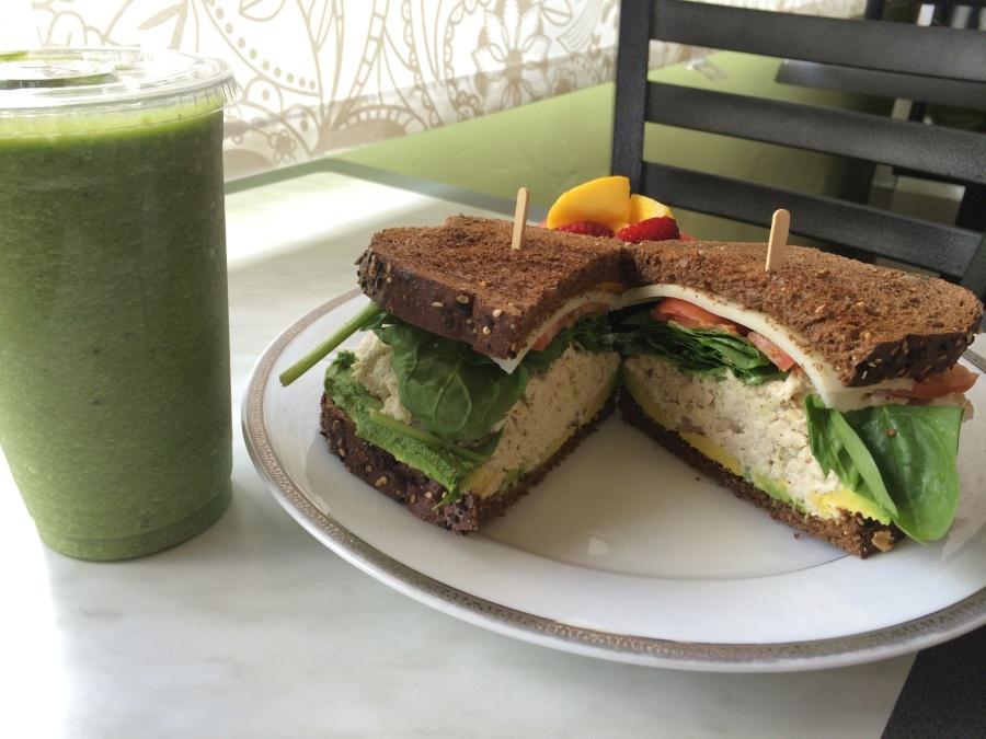 The Liv Green Smoothie contains cactus, pineapple and various fruits. The Chicken Salad Sandwich includes baby spinach, red onion, slices of avocado and provolone cheese. Photo credit: Franchesca Walker
