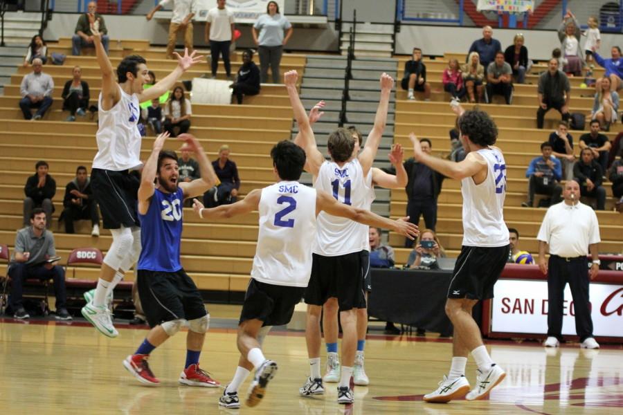 The Santa Monica mens volleyball team celebrating their championship victory as the final whistle blew at the Harry West Gym on April 25. Photo Credit: David Pradel