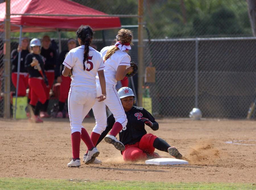 Palomar+College+freshman+third+baseman+Iesha+Hill+slides+to+second+base+during+the+fourth+inning+at+the+Betty+Hock+Softball+Field+on+April+21+where+the+Comets+got+the+14-0+victory+against+the+Knights.+Photo+credit%3A+David+Pradel