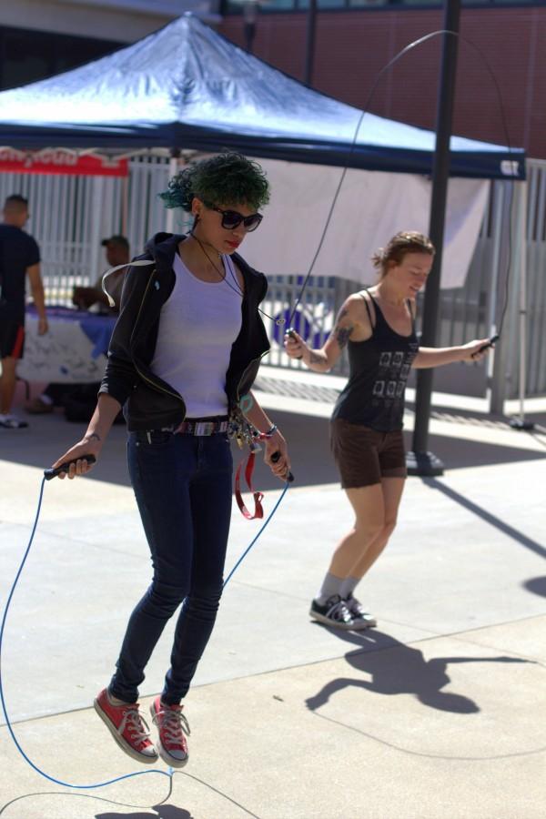 San Diego City College students Alice Kiddo (front) and Bri Rochstein (back) participate at the seventh station during the Health and Wellness Expo on April 10 that was held at the AH/BT quad. Photo credit: David Pradel