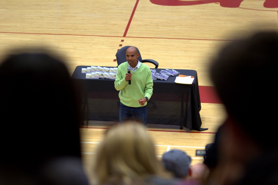 2014 Boston Marathon winner,  Meb Keflezighi tells the story of when he first started running in junior high on May 7 at the Harry West Gym. Photo credit: David Pradel