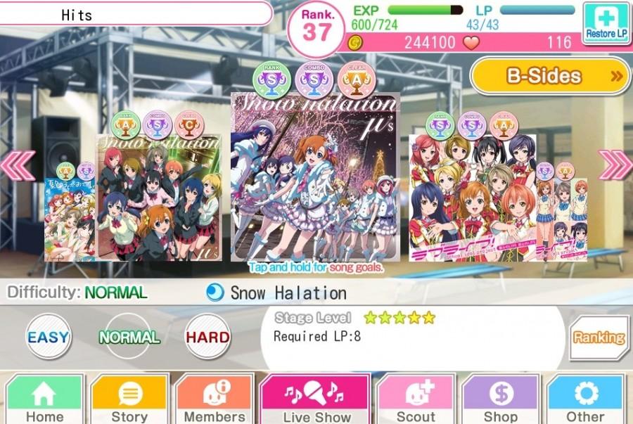 A screen capture shows the Live Show selection for the mobile rhythm game “Love Live! School Idol Festival,” where players can choose either an  A-side or B-side song from school idol group μ’s (“Muse”) to play through, as well as the difficulty. Photo credit: Angelica Wallingford