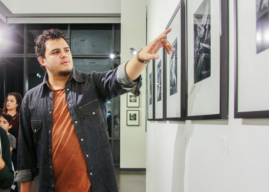 Photography student and exhibition curator Hector Valdivia explains his process in creating five prints for the
new show in the Luxe Gallery at San Diego City College, Nov. 9.