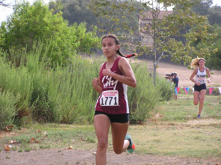Dafne Perez runs for a personal best. Photo courtesy of Knights Athletics.