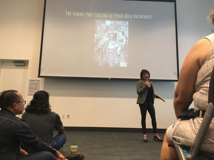 Author Michelle Cruz Gonzales talks to students about her book at City College