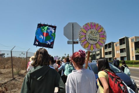 Protestors march during Climate Strike at Mission Bay