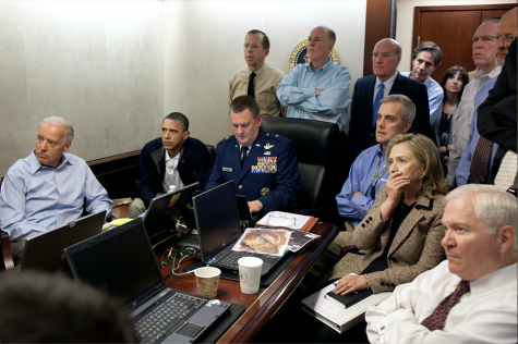 President Obama and Vice president Biden alongside members of the national security team receive an update of the mission against Osama bin Laden.