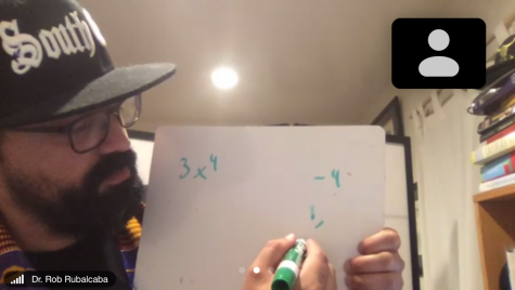 A screenshot of Dr. Rob Rubalcaba with a whiteboard, helping a student with their math on zoom. 