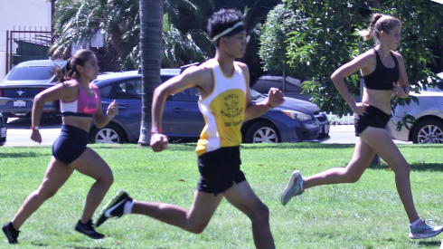 Three runners in Balboa Park