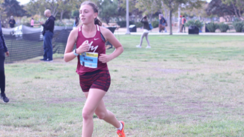 Isabelle Dalton running at the PCAC championship on Oct. 22