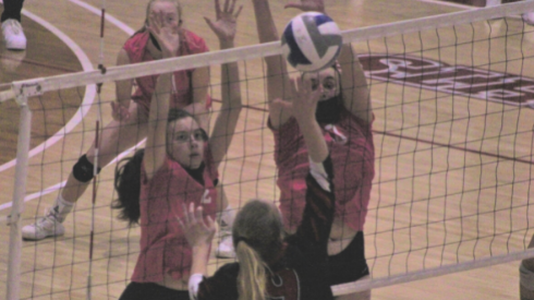 nights Kally Norvell and Elizabeth Hunsaker block volleyball at home match against Palomar College on Oct. 27.