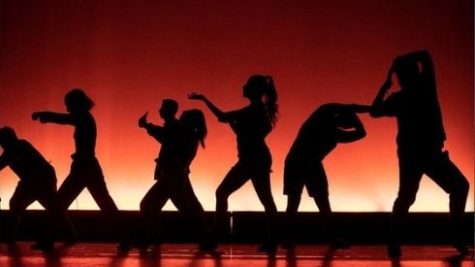 Silhouettes of dancers are shown dancing across a stage. San Diego City College Dance Facebook photo.