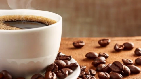 A screenshot picture of a coffee cup and beans.