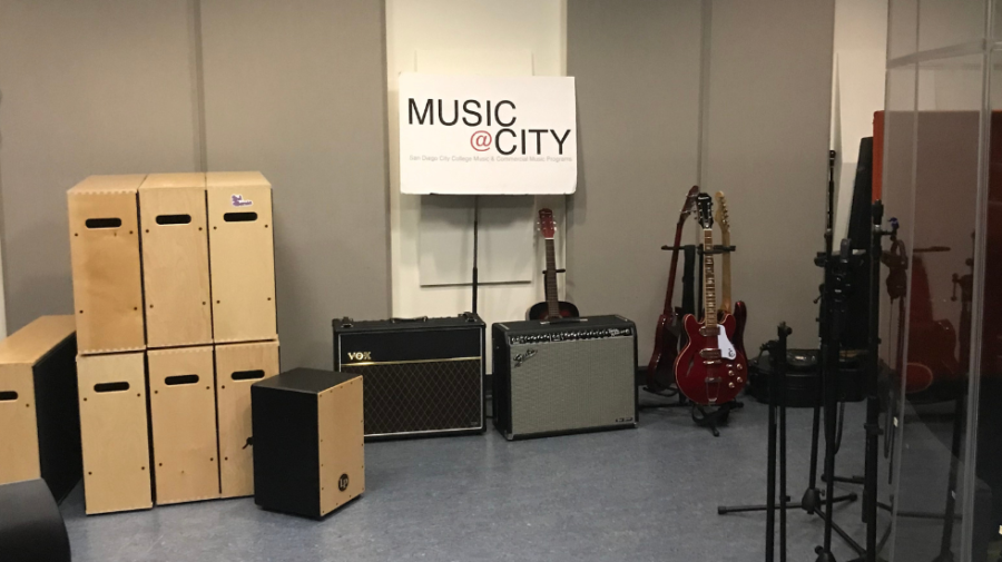 A stage and instruments being set up in C209 for the music clubs open mic night. Photo by Joel Nevarez/City Times Media