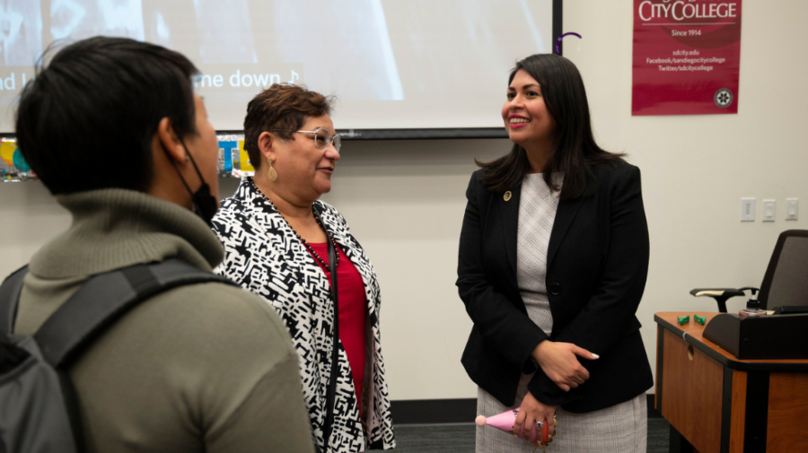 San Diego City College Vice President of Instruction Tillie Chavez, wearing red, talks to Interim California Community College Chancellor Daisy Gonzales, right, at the NEXTUP Birthday Bash on Dec. 8, 2022. San Diego City College on Flickr