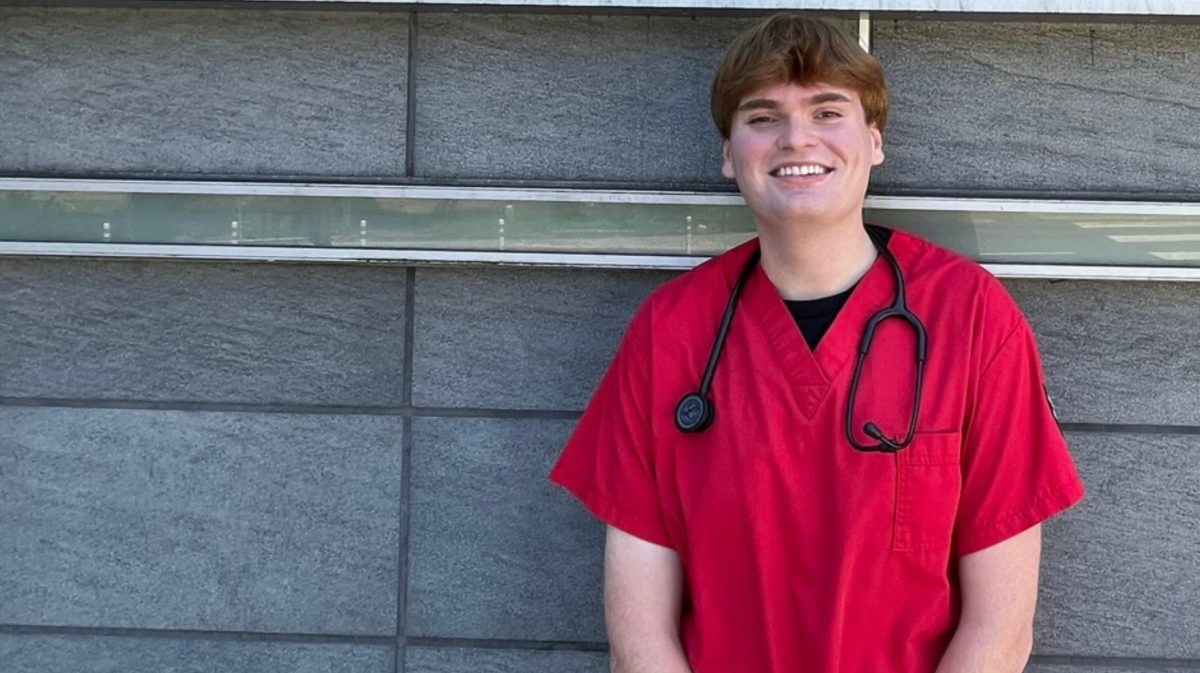 Zachary Simpson stands outside the V building, which houses the nursing program, on the City College campus, August 26, 2023. Photo courtesy of Madeleine Outlaw