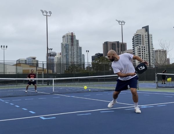Stephan Davila Madrid, right, returns the pickleball to Nilo Ondevilla, left, on the other side of the net, Sept. 16, 2023. Photo by Sean Monney/City Times Media 

