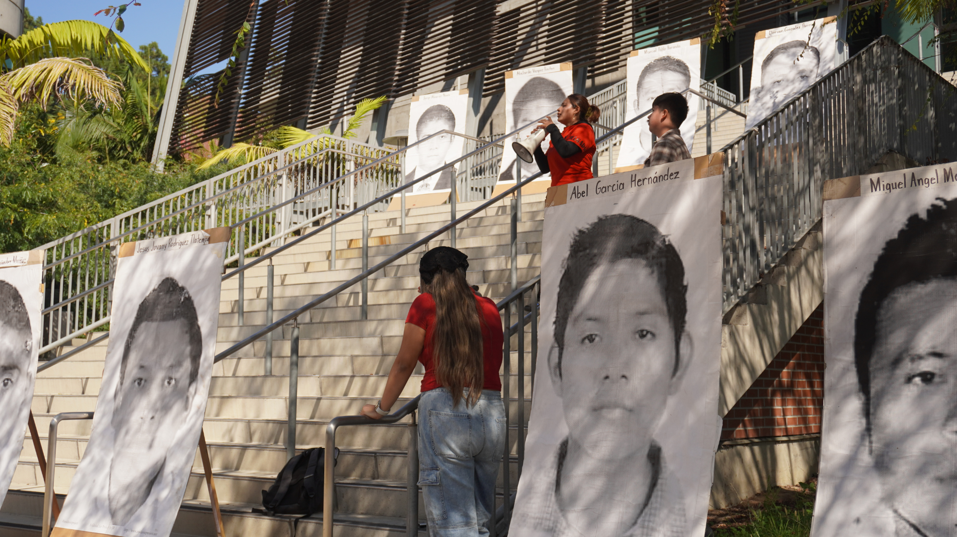 Nicole, a member of the student organization M.E.Ch.A., speaks to the crowd at a rally honoring the 43 missing students from Ayotzinapa, Mexico, September 26, 2023. Photo by Eve McNally