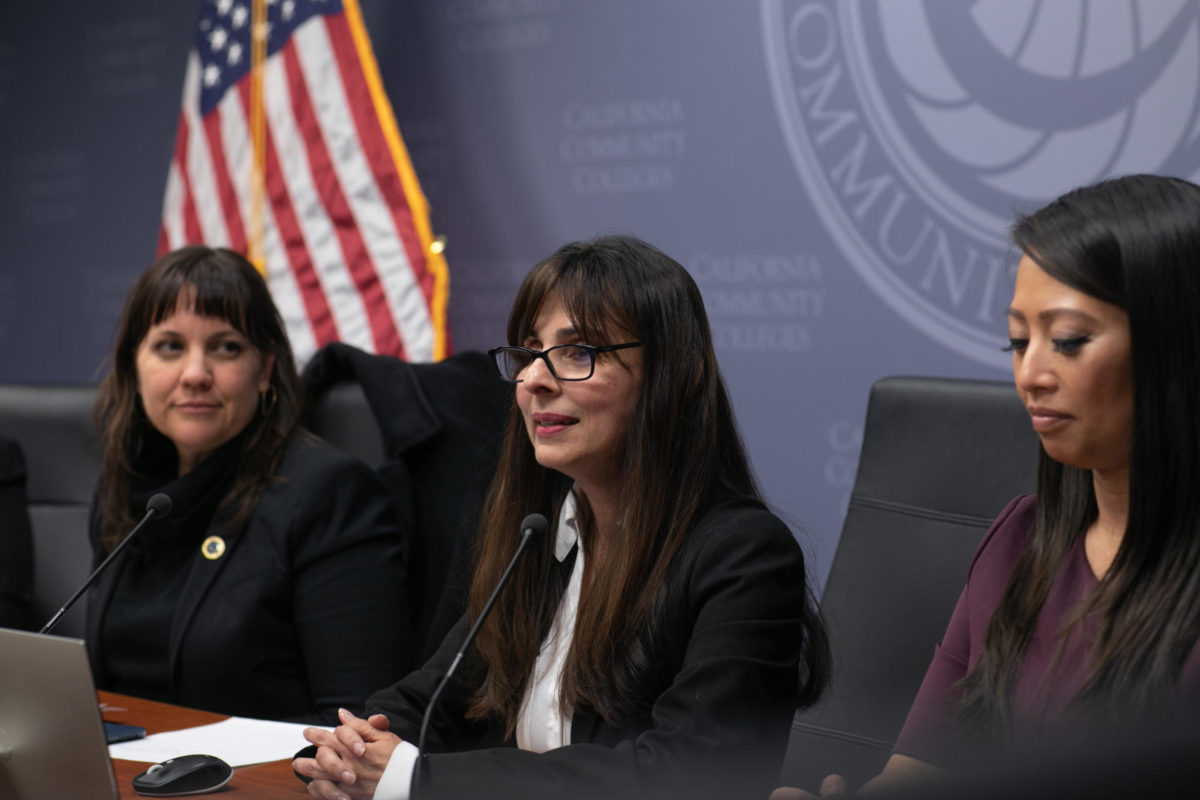 Sonya Christian, center, speaks at a California community colleges board meeting next to Board of Governors President Amy Costa, left, and Board of Governors Vice President Hildegarde Aguinaldo, right, Feb. 23 2023. Photo courtesy of the California Community Colleges photo library