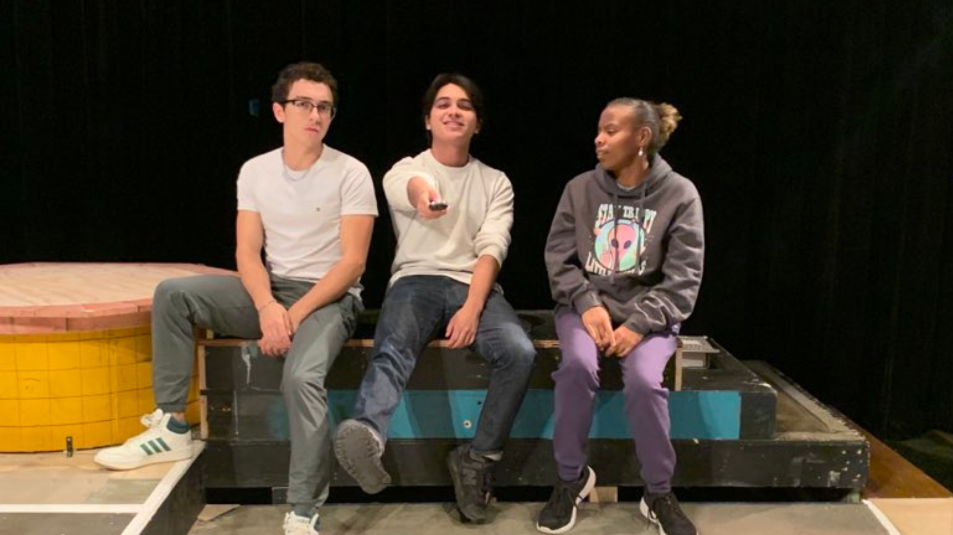 Jeremy Rho, left, Daniel Savala, center, and Lilac Kirkpatrick, right, rehearse a scene for Salvation Road debuting this week. Photo courtesy of Katie Rodda 