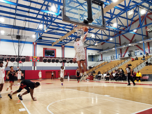 Knights guard Al Green rises to punctuate a second-half City College run with a dunk against Palomar College at Harry West Gym, Wednesday, Jan. 19, 2024. Photo by Vince Outlaw/City Times Media