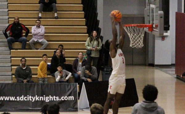 City College Knights forward Kevin Moore (2) puts an exclamation point on the 84-72 victory over Southwestern with a dunk in the final seconds of the game at Harry West Gym, Wednesday, Feb. 7, 2024. Photo by Danny Straus/City Times Media