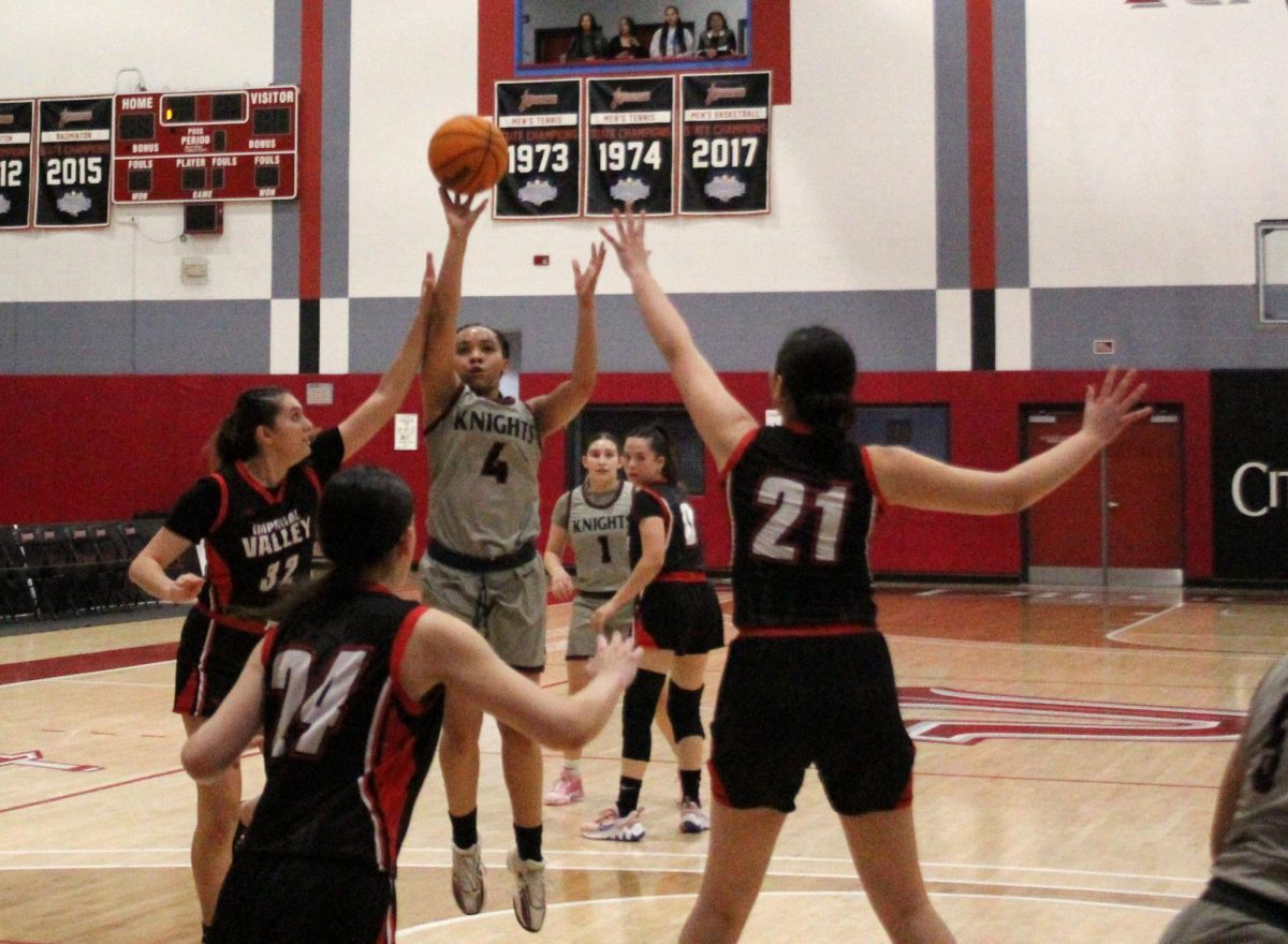 City College freshman Elissa St Julian (4) goes up for a shot over multiple Imperial Valley defenders during first-half action at Harry West Gym, Friday, Feb. 23, 2024. Photo by Danny Straus/City Times Media