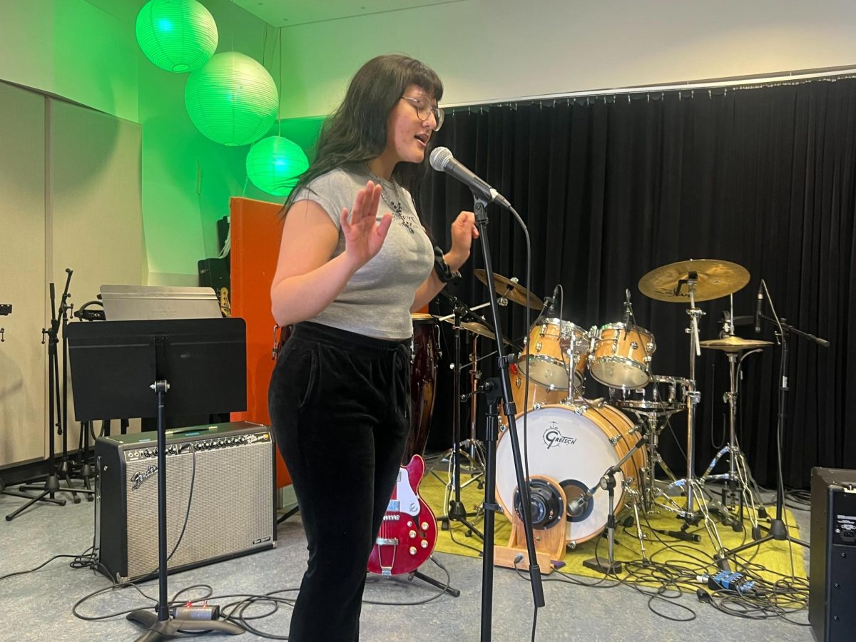 Local Artist Yoli Alma performs original song “Renovar” at the San Diego City College Music Club Open Mic Night Friday, Mar. 1, 2024. Photo by Nadia Lavin/City Times Media