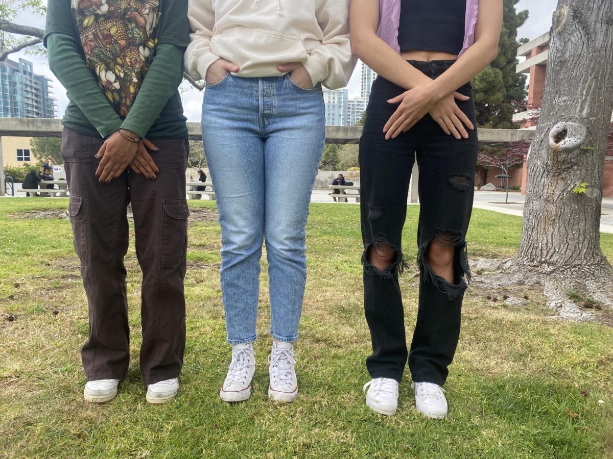 San Diego City College students wearing jeans, posing against sexual assault, Tuesday, April 23, 2024. Photo illustration by Naylise DeGroat and Bailey Kohnen/City Times Media