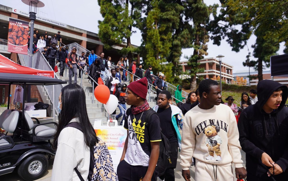 High schoolers flood down the stairs at the San Diego City College Open House, Thursday, April 18, 2024. Photo by Naylise DeGroat/City Times Media 