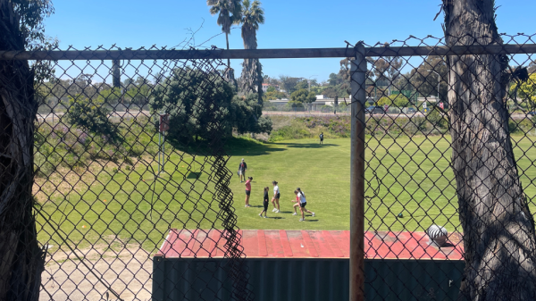 A cut-open fence overlooking San Diego City College’s practice field was used as an entry way for theft on campus. Photo by Danny Straus/City Times Media
