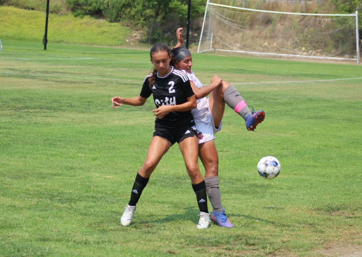 City College women’s soccer player Christiana Macias (2) battles for possession against Compton’s captain Georgina Moreno, right, in the Knights’ 4-4 tie, Friday, September 6, 2024. Photo by David J. Bohnet/City Times Media