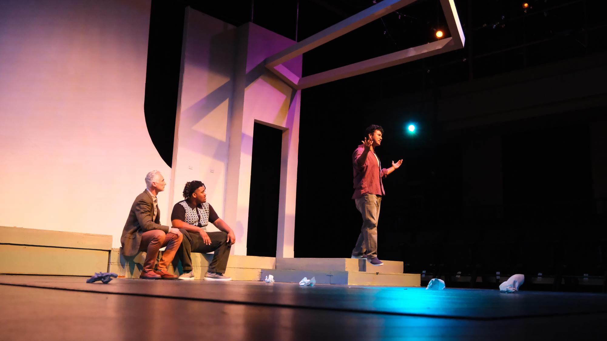 Sorn, left, played by Danny Sharkey and Dev, center, played by David Thornton listen intently to Con, right, played by Fortino Aguilar in “Stupid F##king Bird,” Oct. 20, 2024 at the San Diego City College Black Box Theatre. Photo credit: Veronica Springer/City College Theatre