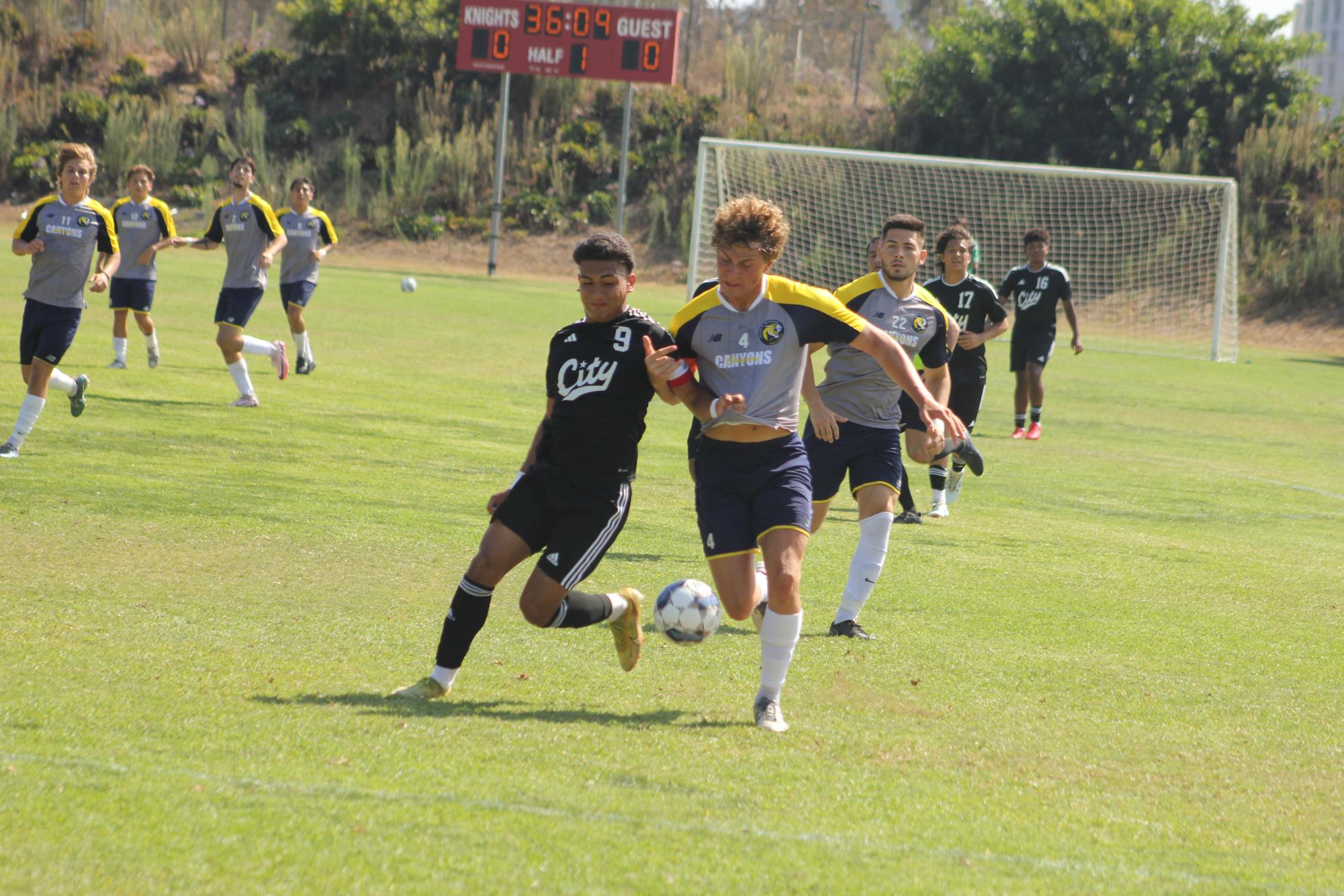 City College freshman Christopher Miramontes (9) battles for possession with a College of the Canyons defender at home, August 30, 2024. Photo by Danny Straus/City Times Media