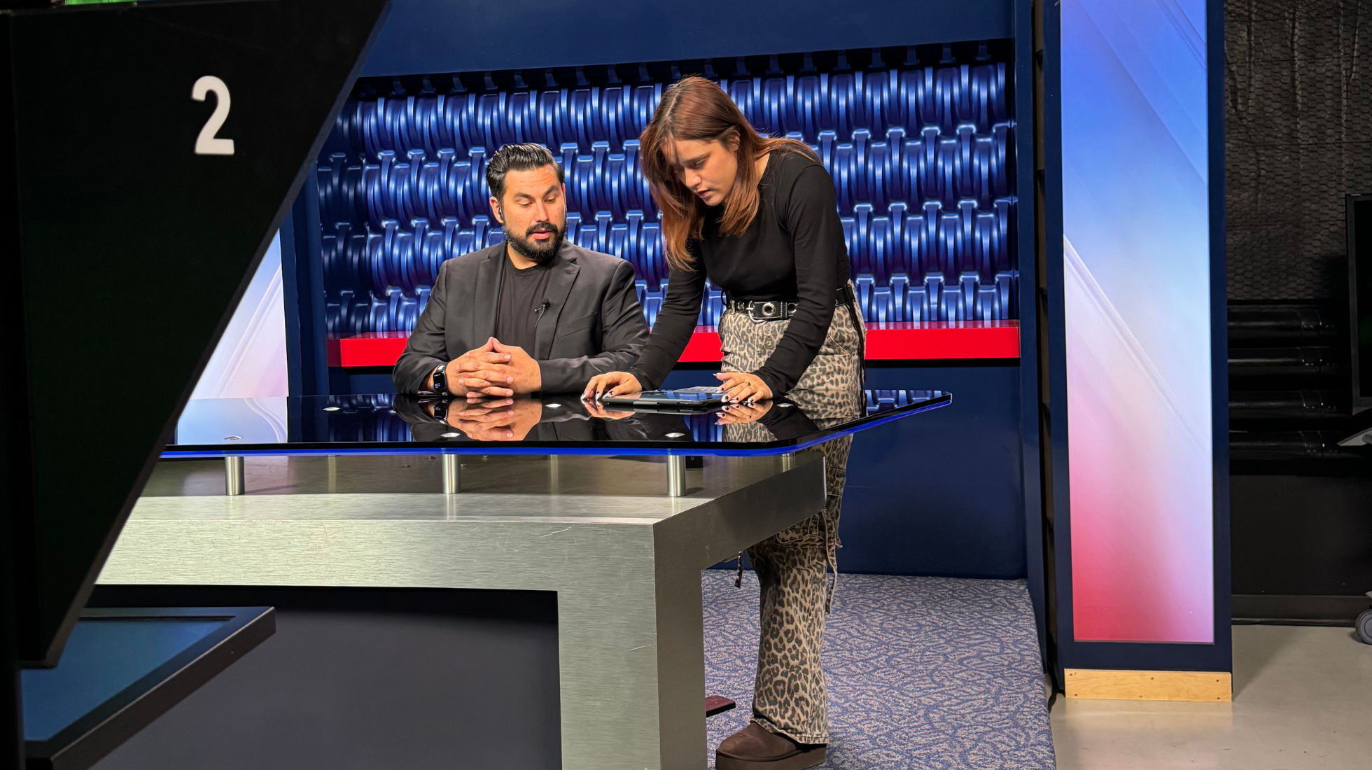 Newscene anchor David J. Bohnet, left, gets feedback from producer Sarai Gomez Huerta, right, before recording the post-election episode, Wednesday, Nov. 13, 2024. Photo by Yonatan “Yogi” Hernandez/City Times Media