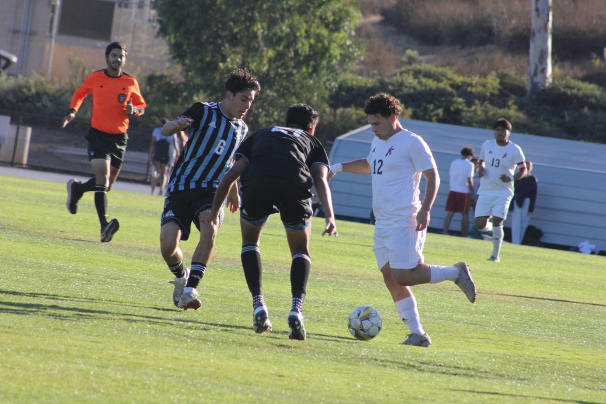 City College freshman midfielder Alberto Esparza (12) dribbles against two Cuyamaca defenders at Cuyamaca College, Tuesday, Oct. 12, 2024. Photo by Danny Straus/City Times Media
