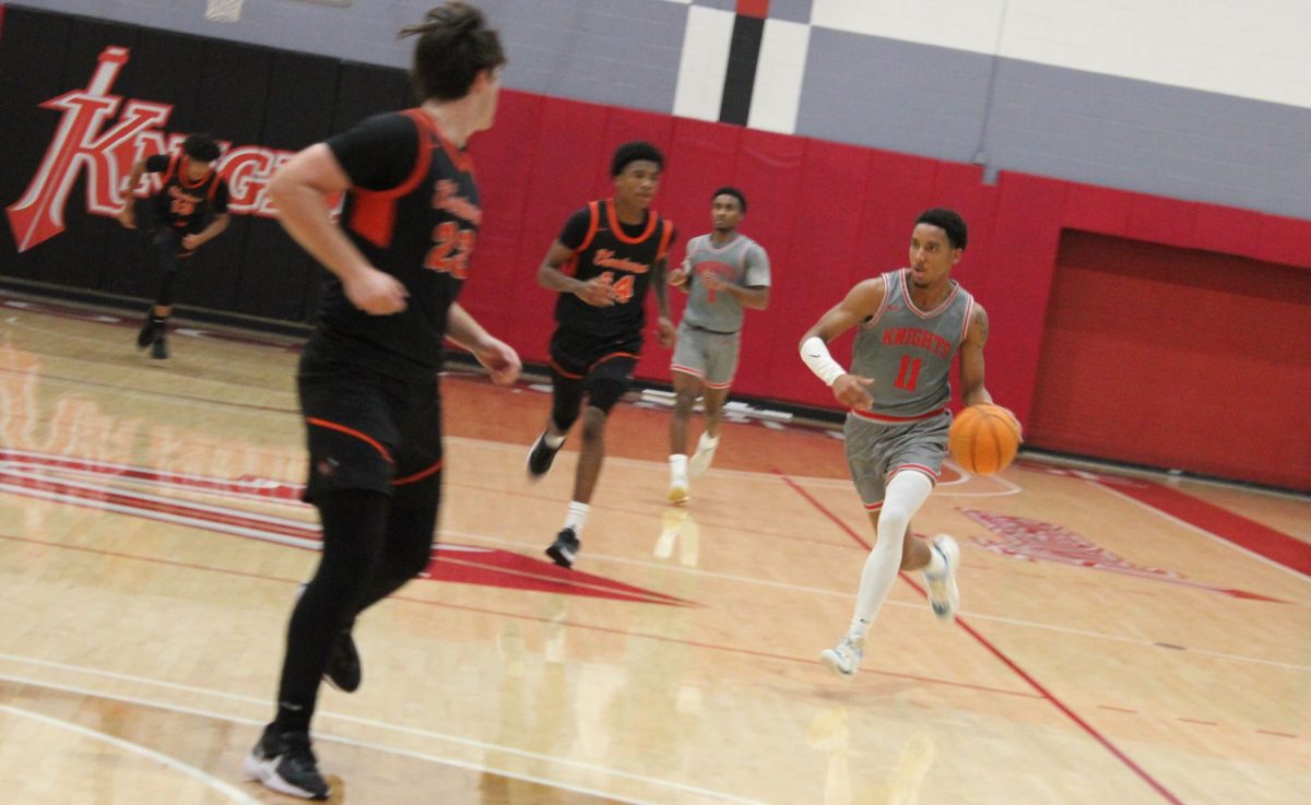 Knights third-year guard Logan Huston, right, dribbles downcourt during City’s 80-75 victory over Ventura College, Saturday, Nov. 16, 2024. Photo by Danny Straus/City Times Media