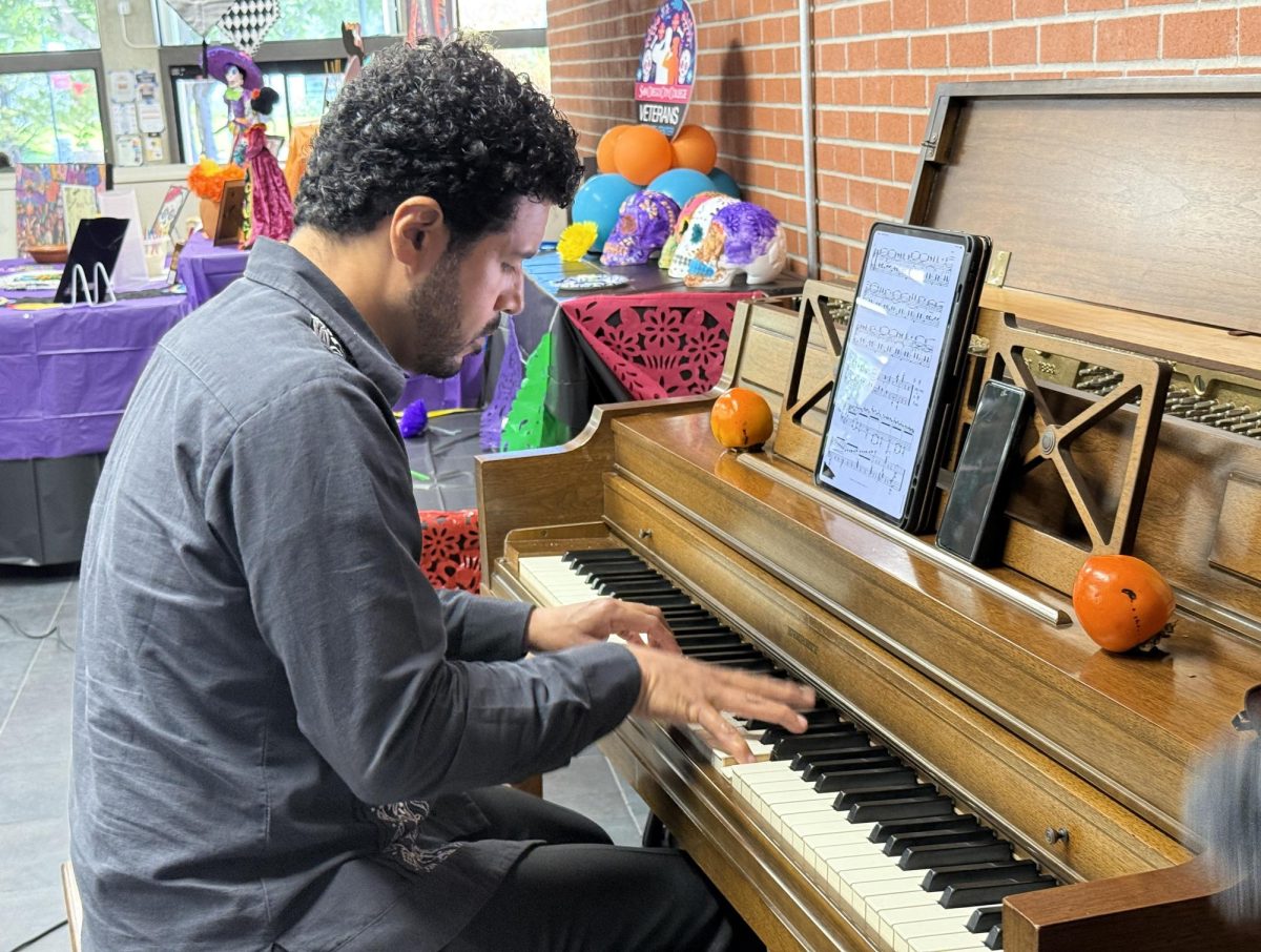 Ivan Mares of the Opera de Tijuana plays the piano to open the musical performance during the Día de los Muertos campus event Wednesday, Oct. 30, 2024. Photo by Luke Bradbury/City Times Media