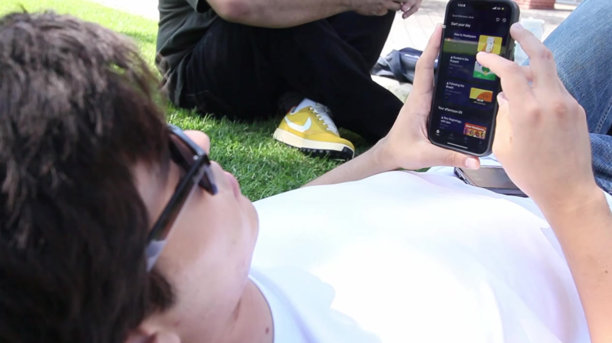 City College student Sergio Velasquez accesses the Headspace app all on his phone, Friday, Oct. 4, 2024. Photo by Sarai Gomez Huerta/City Times Media