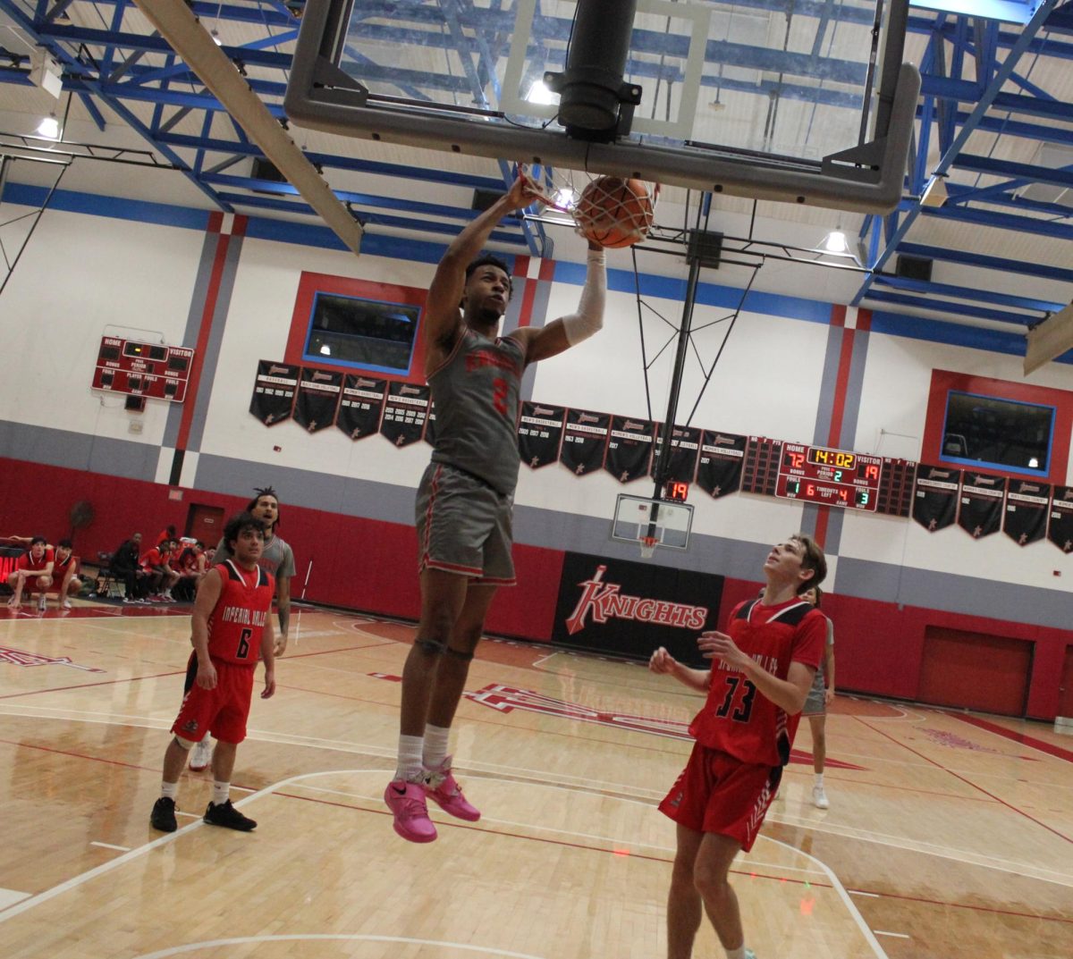 City College freshman forward Abraham Kamano (2) dunks in second-half action of City’s 119-29 victory over Imperial Valley College at Harry West Gym, Saturday, Jan. 4, 2025. Photo by Danny Straus/City Times Media 
