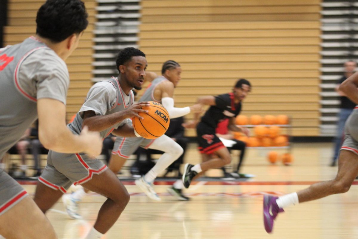 City College sophomore guard Kenny Gonzalez pushes the ball down the court vs Palomar in the Knights' final home game of the regular season on Friday, Feb. 21, 2025. Photo by David J. Bohnet/City Times Media